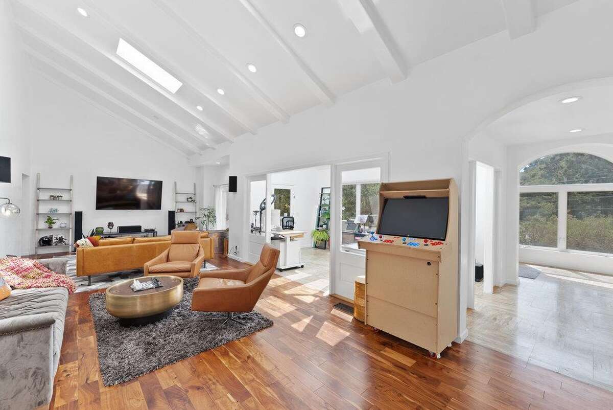 65 Dipsea Road. Stinson Beach, CA PRICE: $4,800,000 DESCRIPTION: Dip into the calm sublime of the maritime... Situated on the widest stretch of the Seadrift lagoon with beautiful views of the lagoon and Mount Tamalpais, this Dipsea darling is surrounded by natural beauty. A short walk to downtown Stinson Beach and a stunning, 40 minute drive to the Golden Gate, you can't ask for a better location for your vacation home. Brimming with natural light and water views from every room, you’ll settle quickly into the calmness and joy this darling home emanates. The spacious two bedroom, two bathroom home has much to offer, with plenty of storage for all the fun toys that come with beach life; surfboards hanging in the garage, beach cruisers ready to ride, and kayaks and standup paddleboards stowed away on the lower dock — where you can plunge right into the Seadrift lagoon. Life at the beach doesn't get any better than this. Within the Seadrift community, you are rooted in coastal comfort with easy access to the bird sanctuary on the Bolinas lagoon, the coveted Seadrift beach with great surf and beautiful views, tennis and pickleball courts, and easy access to the Tamalpais trails. This Dipsea darling is a home for making memories to be cherished forever. Specifications: ? Spacious 2 bedroom 2 full bath ? 1859 square footage house ? 7500 square footage lot ? Primary bedroom with grand en suite bathroom ? Second bedroom and second full bathroom separated by the main living space ? Den area ? Kitchen island and open concept living area with fireplace ? Dining room ? Wraparound back deck and lower dock ? Hot tub ? Lower storage...