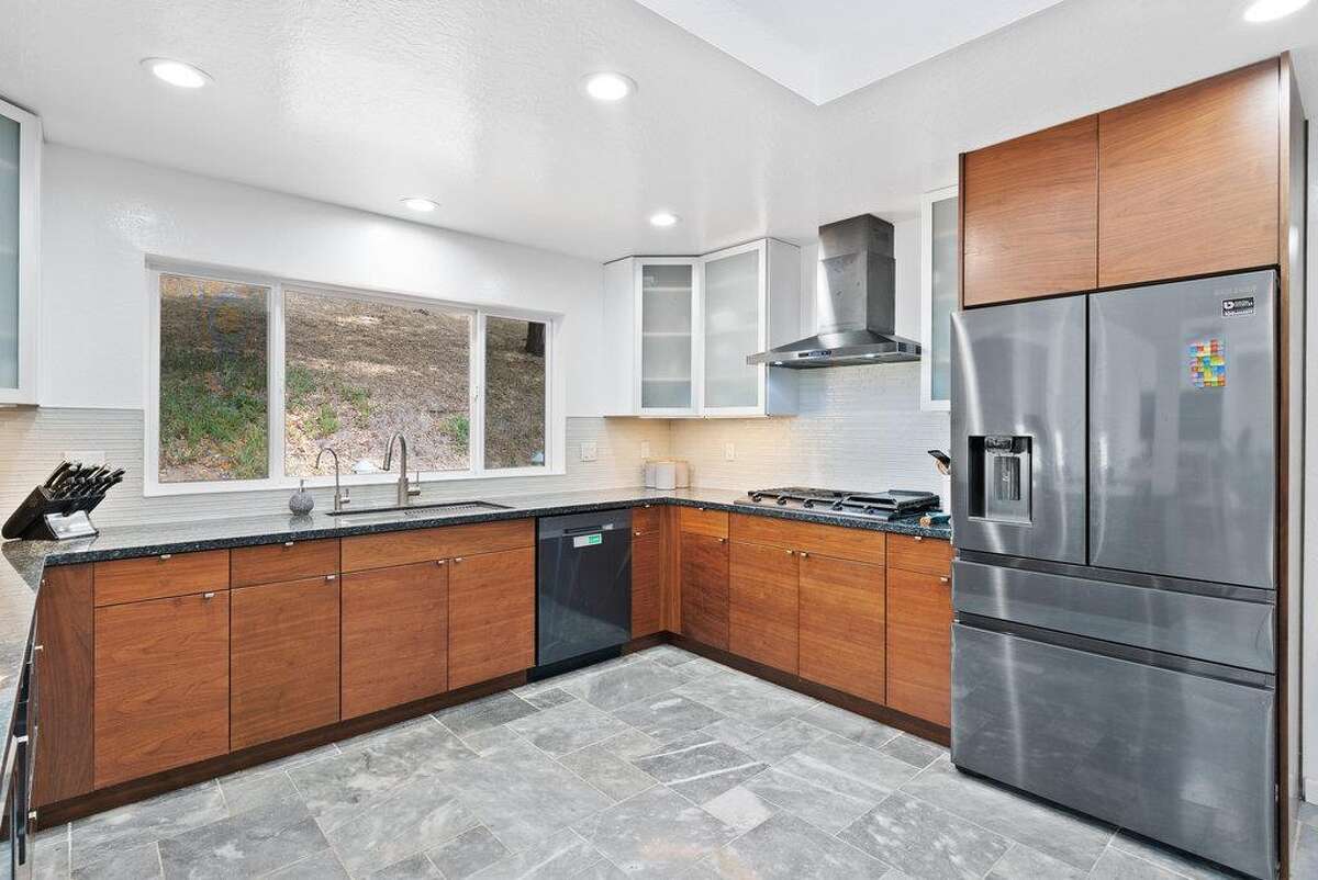 65 Dipsea Road. Stinson Beach, CA PRICE: $4,800,000 DESCRIPTION: Dip into the calm sublime of the maritime... Situated on the widest stretch of the Seadrift lagoon with beautiful views of the lagoon and Mount Tamalpais, this Dipsea darling is surrounded by natural beauty. A short walk to downtown Stinson Beach and a stunning, 40 minute drive to the Golden Gate, you can't ask for a better location for your vacation home. Brimming with natural light and water views from every room, you’ll settle quickly into the calmness and joy this darling home emanates. The spacious two bedroom, two bathroom home has much to offer, with plenty of storage for all the fun toys that come with beach life; surfboards hanging in the garage, beach cruisers ready to ride, and kayaks and standup paddleboards stowed away on the lower dock — where you can plunge right into the Seadrift lagoon. Life at the beach doesn't get any better than this. Within the Seadrift community, you are rooted in coastal comfort with easy access to the bird sanctuary on the Bolinas lagoon, the coveted Seadrift beach with great surf and beautiful views, tennis and pickleball courts, and easy access to the Tamalpais trails. This Dipsea darling is a home for making memories to be cherished forever. Specifications: ? Spacious 2 bedroom 2 full bath ? 1859 square footage house ? 7500 square footage lot ? Primary bedroom with grand en suite bathroom ? Second bedroom and second full bathroom separated by the main living space ? Den area ? Kitchen island and open concept living area with fireplace ? Dining room ? Wraparound back deck and lower dock ? Hot tub ? Lower storage...