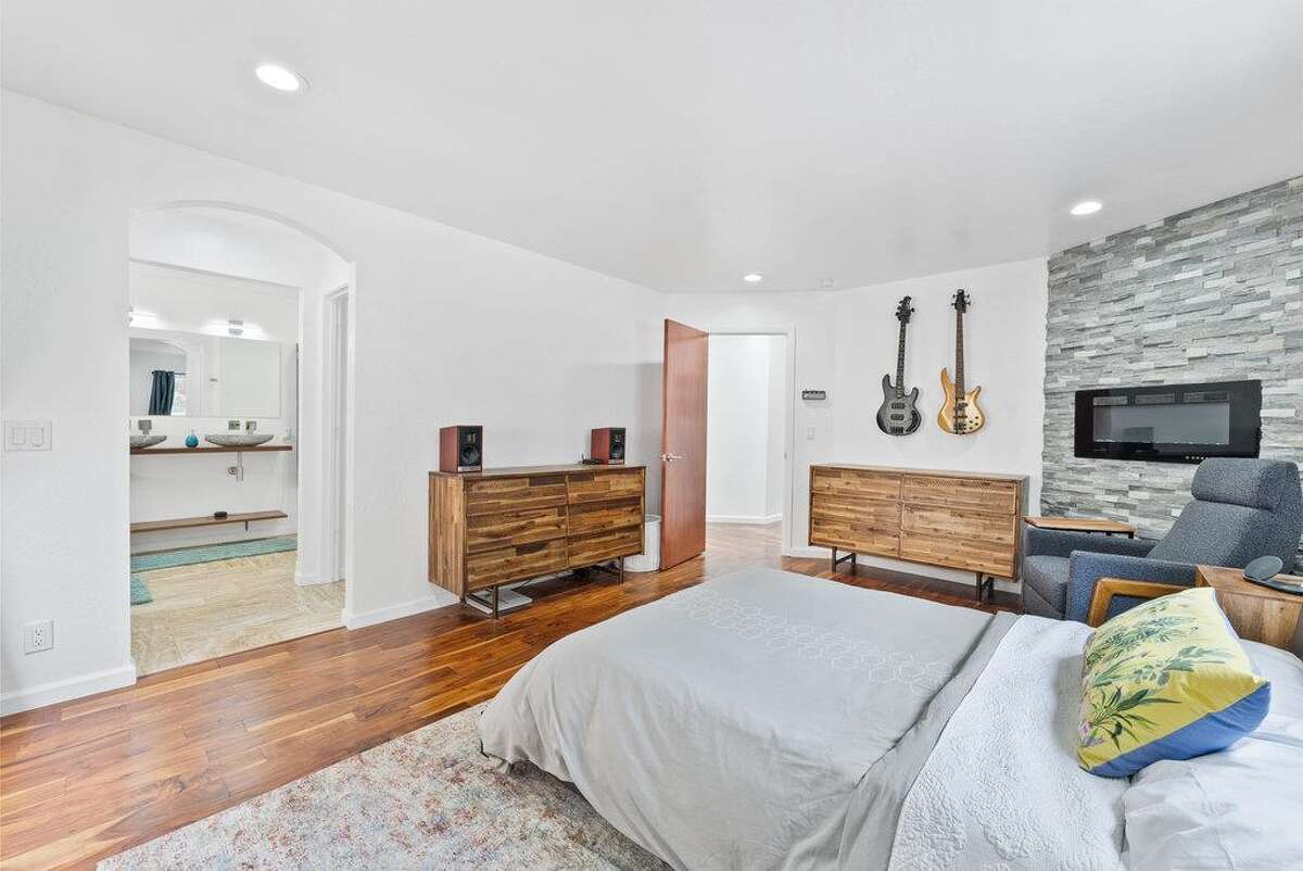 65 Dipsea Road. Stinson Beach, CA PRICE: $4,800,000 DESCRIPTION: Dip into the calm sublime of the maritime... Situated on the widest stretch of the Seadrift lagoon with beautiful views of the lagoon and Mount Tamalpais, this Dipsea darling is surrounded by natural beauty. A short walk to downtown Stinson Beach and a stunning, 40 minute drive to the Golden Gate, you can't ask for a better location for your vacation home. Brimming with natural light and water views from every room, you’ll settle quickly into the calmness and joy this darling home emanates. The spacious two bedroom, two bathroom home has much to offer, with plenty of storage for all the fun toys that come with beach life; surfboards hanging in the garage, beach cruisers ready to ride, and kayaks and standup paddleboards stowed away on the lower dock — where you can plunge right into the Seadrift lagoon. Life at the beach doesn't get any better than this. Within the Seadrift community, you are rooted in coastal comfort with easy access to the bird sanctuary on the Bolinas lagoon, the coveted Seadrift beach with great surf and beautiful views, tennis and pickleball courts, and easy access to the Tamalpais trails. This Dipsea darling is a home for making memories to be cherished forever. Specifications: ? Spacious 2 bedroom 2 full bath ? 1859 square footage house ? 7500 square footage lot ? Primary bedroom with grand en suite bathroom ? Second bedroom and second full bathroom separated by the main living space ? Den area ? Kitchen island and open concept living area with fireplace ? Dining room ? Wraparound back deck and lower dock ? Hot tub ? Lower storage...