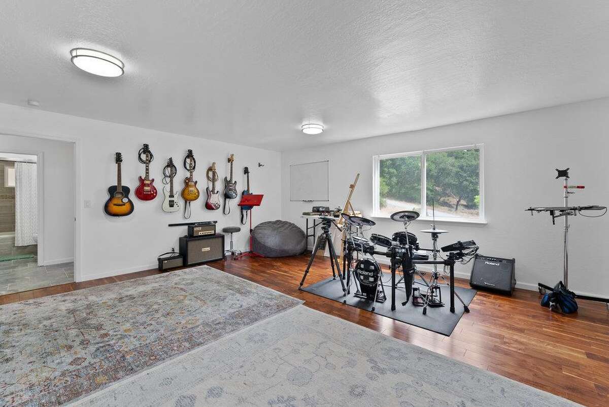 65 Dipsea Road. Stinson Beach, CA PRICE: $4,800,000 DESCRIPTION: Dip into the calm sublime of the maritime... Situated on the widest stretch of the Seadrift lagoon with beautiful views of the lagoon and Mount Tamalpais, this Dipsea darling is surrounded by natural beauty. A short walk to downtown Stinson Beach and a stunning, 40 minute drive to the Golden Gate, you can't ask for a better location for your vacation home. Brimming with natural light and water views from every room, you’ll settle quickly into the calmness and joy this darling home emanates. The spacious two bedroom, two bathroom home has much to offer, with plenty of storage for all the fun toys that come with beach life; surfboards hanging in the garage, beach cruisers ready to ride, and kayaks and standup paddleboards stowed away on the lower dock — where you can plunge right into the Seadrift lagoon. Life at the beach doesn't get any better than this. Within the Seadrift community, you are rooted in coastal comfort with easy access to the bird sanctuary on the Bolinas lagoon, the coveted Seadrift beach with great surf and beautiful views, tennis and pickleball courts, and easy access to the Tamalpais trails. This Dipsea darling is a home for making memories to be cherished forever. Specifications: ? Spacious 2 bedroom 2 full bath ? 1859 square footage house ? 7500 square footage lot ? Primary bedroom with grand en suite bathroom ? Second bedroom and second full bathroom separated by the main living space ? Den area ? Kitchen island and open concept living area with fireplace ? Dining room ? Wraparound back deck and lower dock ? Hot tub ? Lower storage...