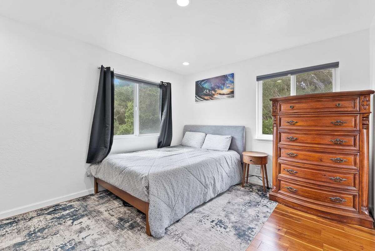 65 Dipsea Road. Stinson Beach, CA PRICE: $4,800,000 DESCRIPTION: Dip into the calm sublime of the maritime... Situated on the widest stretch of the Seadrift lagoon with beautiful views of the lagoon and Mount Tamalpais, this Dipsea darling is surrounded by natural beauty. A short walk to downtown Stinson Beach and a stunning, 40 minute drive to the Golden Gate, you can't ask for a better location for your vacation home. Brimming with natural light and water views from every room, you’ll settle quickly into the calmness and joy this darling home emanates. The spacious two bedroom, two bathroom home has much to offer, with plenty of storage for all the fun toys that come with beach life; surfboards hanging in the garage, beach cruisers ready to ride, and kayaks and standup paddleboards stowed away on the lower dock — where you can plunge right into the Seadrift lagoon. Life at the beach doesn't get any better than this. Within the Seadrift community, you are rooted in coastal comfort with easy access to the bird sanctuary on the Bolinas lagoon, the coveted Seadrift beach with great surf and beautiful views, tennis and pickleball courts, and easy access to the Tamalpais trails. This Dipsea darling is a home for making memories to be cherished forever. Specifications: ? Spacious 2 bedroom 2 full bath ? 1859 square footage house ? 7500 square footage lot ? Primary bedroom with grand en suite bathroom ? Second bedroom and second full bathroom separated by the main living space ? Den area ? Kitchen island and open concept living area with fireplace ? Dining room ? Wraparound back deck and lower dock ? Hot tub ? Lower storage...