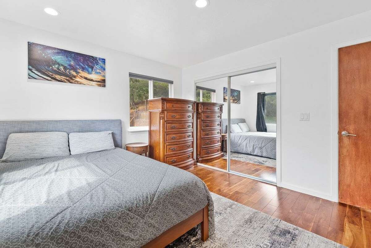 65 Dipsea Road. Stinson Beach, CA PRICE: $4,800,000 DESCRIPTION: Dip into the calm sublime of the maritime... Situated on the widest stretch of the Seadrift lagoon with beautiful views of the lagoon and Mount Tamalpais, this Dipsea darling is surrounded by natural beauty. A short walk to downtown Stinson Beach and a stunning, 40 minute drive to the Golden Gate, you can't ask for a better location for your vacation home. Brimming with natural light and water views from every room, you’ll settle quickly into the calmness and joy this darling home emanates. The spacious two bedroom, two bathroom home has much to offer, with plenty of storage for all the fun toys that come with beach life; surfboards hanging in the garage, beach cruisers ready to ride, and kayaks and standup paddleboards stowed away on the lower dock — where you can plunge right into the Seadrift lagoon. Life at the beach doesn't get any better than this. Within the Seadrift community, you are rooted in coastal comfort with easy access to the bird sanctuary on the Bolinas lagoon, the coveted Seadrift beach with great surf and beautiful views, tennis and pickleball courts, and easy access to the Tamalpais trails. This Dipsea darling is a home for making memories to be cherished forever. Specifications: ? Spacious 2 bedroom 2 full bath ? 1859 square footage house ? 7500 square footage lot ? Primary bedroom with grand en suite bathroom ? Second bedroom and second full bathroom separated by the main living space ? Den area ? Kitchen island and open concept living area with fireplace ? Dining room ? Wraparound back deck and lower dock ? Hot tub ? Lower storage...