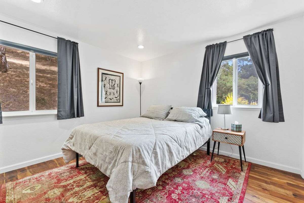 65 Dipsea Road. Stinson Beach, CA PRICE: $4,800,000 DESCRIPTION: Dip into the calm sublime of the maritime... Situated on the widest stretch of the Seadrift lagoon with beautiful views of the lagoon and Mount Tamalpais, this Dipsea darling is surrounded by natural beauty. A short walk to downtown Stinson Beach and a stunning, 40 minute drive to the Golden Gate, you can't ask for a better location for your vacation home. Brimming with natural light and water views from every room, you’ll settle quickly into the calmness and joy this darling home emanates. The spacious two bedroom, two bathroom home has much to offer, with plenty of storage for all the fun toys that come with beach life; surfboards hanging in the garage, beach cruisers ready to ride, and kayaks and standup paddleboards stowed away on the lower dock — where you can plunge right into the Seadrift lagoon. Life at the beach doesn't get any better than this. Within the Seadrift community, you are rooted in coastal comfort with easy access to the bird sanctuary on the Bolinas lagoon, the coveted Seadrift beach with great surf and beautiful views, tennis and pickleball courts, and easy access to the Tamalpais trails. This Dipsea darling is a home for making memories to be cherished forever. Specifications: ? Spacious 2 bedroom 2 full bath ? 1859 square footage house ? 7500 square footage lot ? Primary bedroom with grand en suite bathroom ? Second bedroom and second full bathroom separated by the main living space ? Den area ? Kitchen island and open concept living area with fireplace ? Dining room ? Wraparound back deck and lower dock ? Hot tub ? Lower storage...