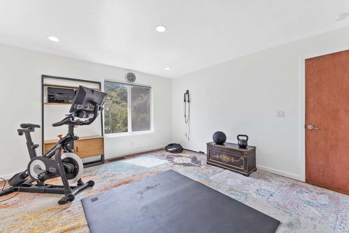 65 Dipsea Road. Stinson Beach, CA PRICE: $4,800,000 DESCRIPTION: Dip into the calm sublime of the maritime... Situated on the widest stretch of the Seadrift lagoon with beautiful views of the lagoon and Mount Tamalpais, this Dipsea darling is surrounded by natural beauty. A short walk to downtown Stinson Beach and a stunning, 40 minute drive to the Golden Gate, you can't ask for a better location for your vacation home. Brimming with natural light and water views from every room, you’ll settle quickly into the calmness and joy this darling home emanates. The spacious two bedroom, two bathroom home has much to offer, with plenty of storage for all the fun toys that come with beach life; surfboards hanging in the garage, beach cruisers ready to ride, and kayaks and standup paddleboards stowed away on the lower dock — where you can plunge right into the Seadrift lagoon. Life at the beach doesn't get any better than this. Within the Seadrift community, you are rooted in coastal comfort with easy access to the bird sanctuary on the Bolinas lagoon, the coveted Seadrift beach with great surf and beautiful views, tennis and pickleball courts, and easy access to the Tamalpais trails. This Dipsea darling is a home for making memories to be cherished forever. Specifications: ? Spacious 2 bedroom 2 full bath ? 1859 square footage house ? 7500 square footage lot ? Primary bedroom with grand en suite bathroom ? Second bedroom and second full bathroom separated by the main living space ? Den area ? Kitchen island and open concept living area with fireplace ? Dining room ? Wraparound back deck and lower dock ? Hot tub ? Lower storage...
