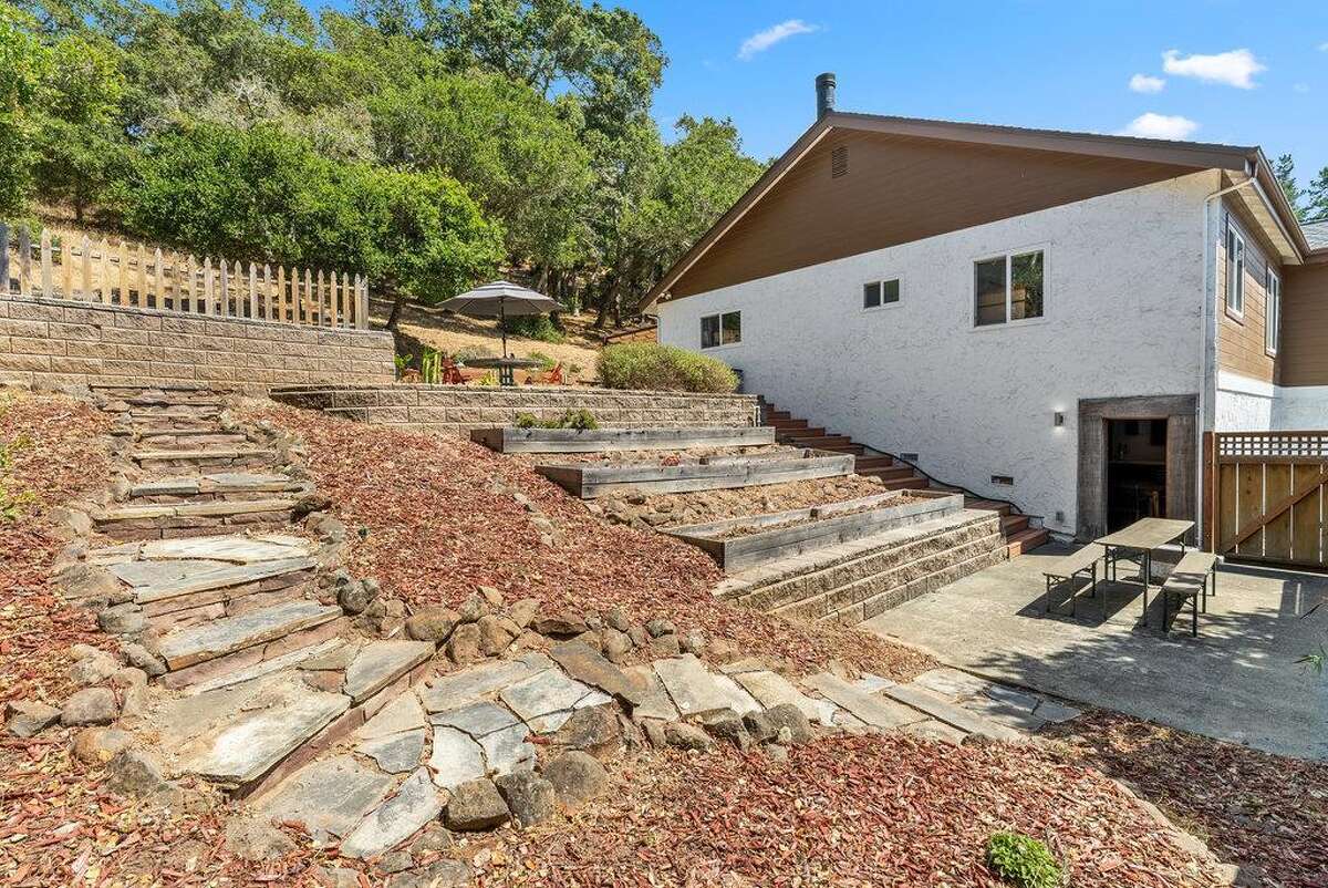 65 Dipsea Road. Stinson Beach, CA PRICE: $4,800,000 DESCRIPTION: Dip into the calm sublime of the maritime... Situated on the widest stretch of the Seadrift lagoon with beautiful views of the lagoon and Mount Tamalpais, this Dipsea darling is surrounded by natural beauty. A short walk to downtown Stinson Beach and a stunning, 40 minute drive to the Golden Gate, you can't ask for a better location for your vacation home. Brimming with natural light and water views from every room, you’ll settle quickly into the calmness and joy this darling home emanates. The spacious two bedroom, two bathroom home has much to offer, with plenty of storage for all the fun toys that come with beach life; surfboards hanging in the garage, beach cruisers ready to ride, and kayaks and standup paddleboards stowed away on the lower dock — where you can plunge right into the Seadrift lagoon. Life at the beach doesn't get any better than this. Within the Seadrift community, you are rooted in coastal comfort with easy access to the bird sanctuary on the Bolinas lagoon, the coveted Seadrift beach with great surf and beautiful views, tennis and pickleball courts, and easy access to the Tamalpais trails. This Dipsea darling is a home for making memories to be cherished forever. Specifications: ? Spacious 2 bedroom 2 full bath ? 1859 square footage house ? 7500 square footage lot ? Primary bedroom with grand en suite bathroom ? Second bedroom and second full bathroom separated by the main living space ? Den area ? Kitchen island and open concept living area with fireplace ? Dining room ? Wraparound back deck and lower dock ? Hot tub ? Lower storage...