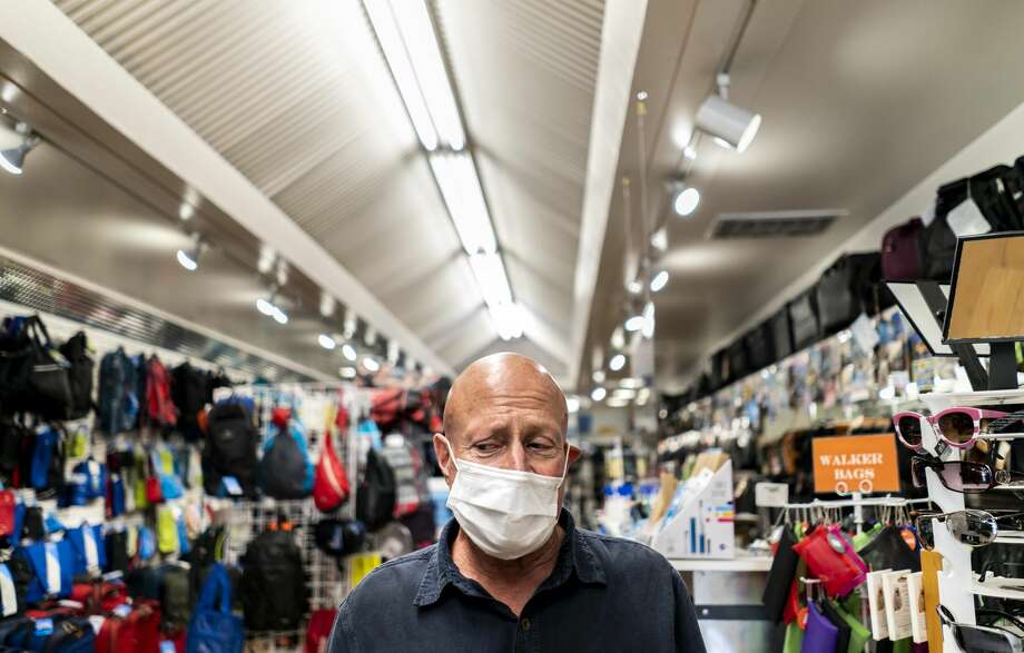 With all social distancing and health protocols adhered to, Bernie Schwartz owner of California Luggage, has re opened like many other businesses in downtown Santa Rosa, as California implements Phase 3 its state-wide economy opening plan during the coronavirus pandemic in Santa Rosa, California on Friday June 12, 2020. Photo: The Washington Post/The Washington Post Via Getty Im / 2020 The Washington Post