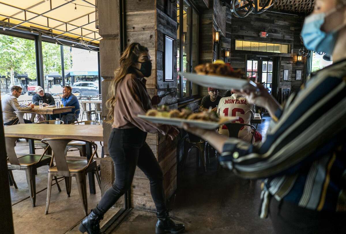 With all social distancing and health protocols adhered to, the Beer Baron Bar & Kitchen, as well as many other businesses in downtown Santa Rosa, are re opening as California implements Phase 3 its state-wide economy opening plan during the coronavirus pandemic in Santa Rosa, California on Friday June 12, 2020.