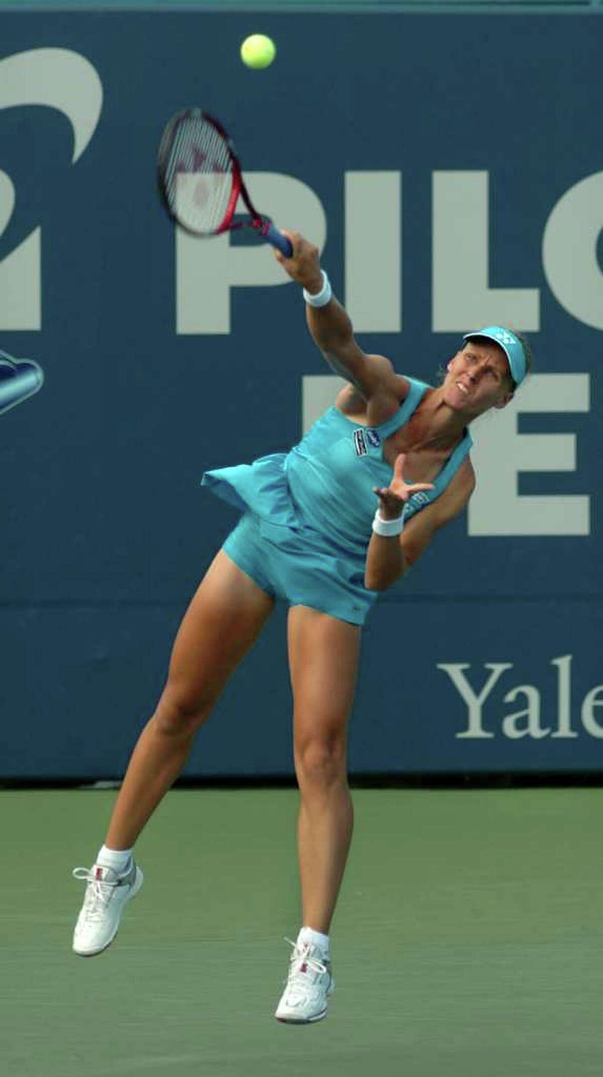 Elena Dementieva serves the ball to her opponent Marion Bartoli at the Pilot Pen tennis tournament in New Haven, Conn. on Thursday August 26, 2010. Dementieva beat Bartoli 6-3, 3-6, 6-2.