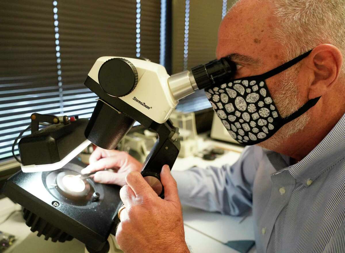 Steven Silver, gemologist, works at his Jewelry Appraisal Services office Thursday, July 30, 2020, in Houston.