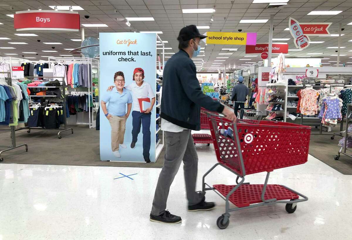COLMA, CALIFORNIA - AUGUST 03: An advertisement for back-to-school uniforms is displayed at a Target store on August 03, 2020 in Colma, California. In the midst of the ongoing coronavirus pandemic, back-to-school shopping has mostly moved to online sales, with purchases shifting from clothing to laptop computers and home schooling supplies. (Photo by Justin Sullivan/Getty Images)