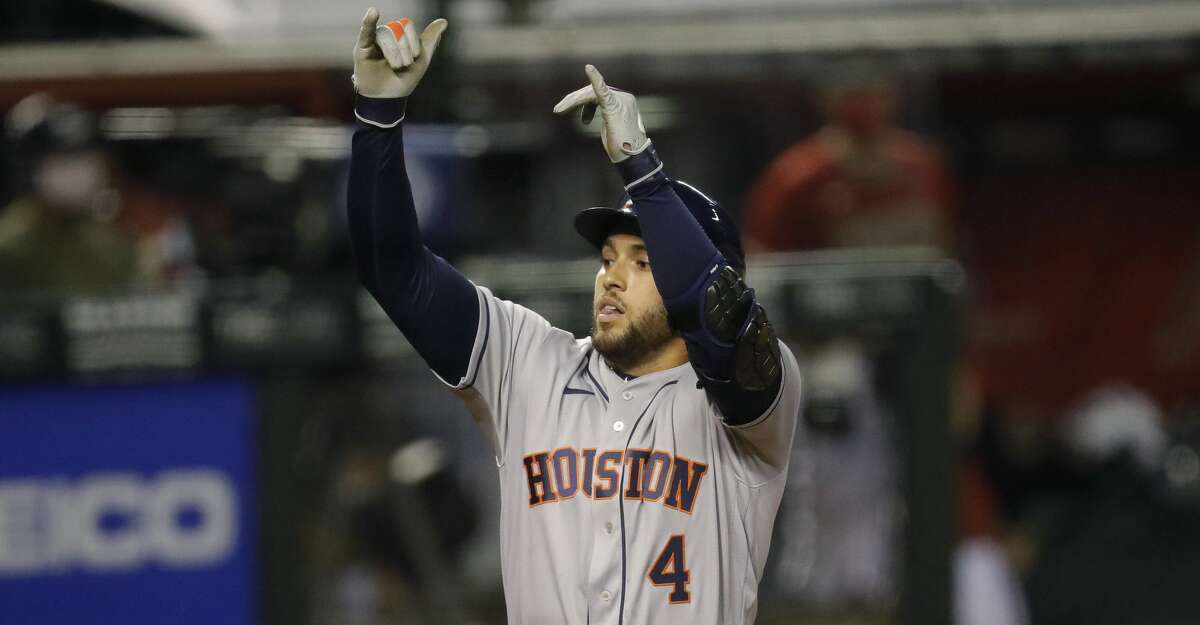 Springer leaves game after being hit on right hand by pitch