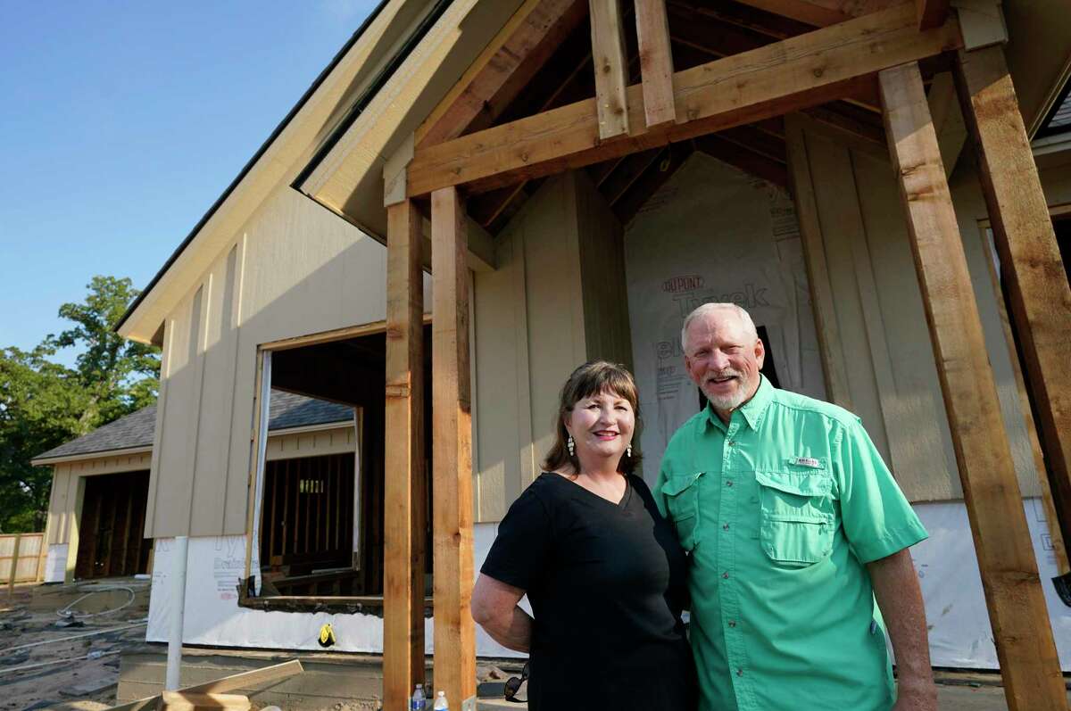 Linda Baker and Mike Baker are shown at the home they are having built in the master planned community Mission Ranch Friday, Aug. 7, 2020, in College Station.