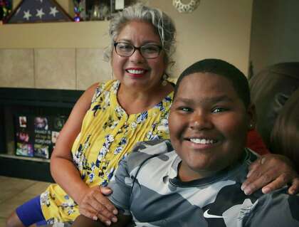 Barbara Espinoza-Vera said that while the San Antonio Independent School District has outlined strict safety protocols to guard against the coronavirus, she is not sure she will send her son, Elijah, to school until there is a vaccine for the virus.