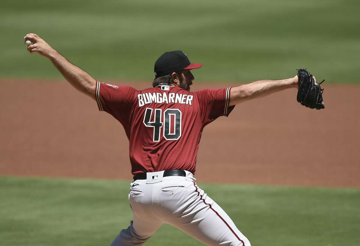 SAN DIEGO, CA - AUGUST 9: Madison Bumgarner #40 of the Arizona Diamondbacks pitches during the first inning of a baseball game against the San Diego Padres at Petco Park on August 9, 2020 in San Diego, California. (Photo by Denis Poroy/Getty Images)