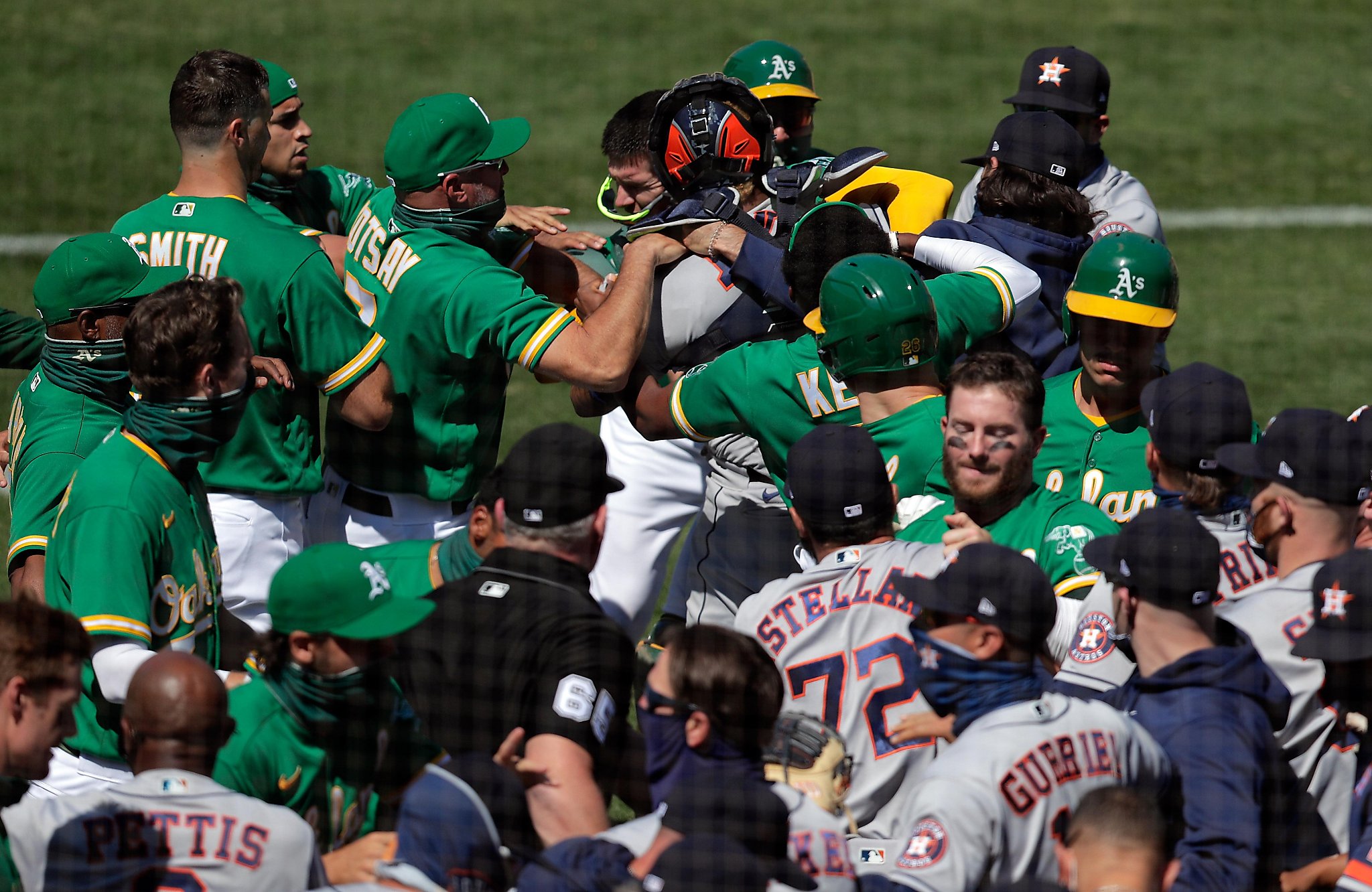 A s Astros mix it up on field but Oakland wins 9th in row