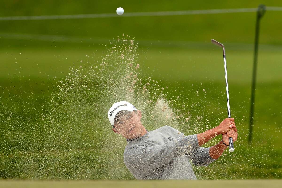Collin Morikawa hits from the 1st hole bunker during final round of PGA Championship at TPC Harding Park in San Francisco, Calif., on Sunday, August 9, 2020.