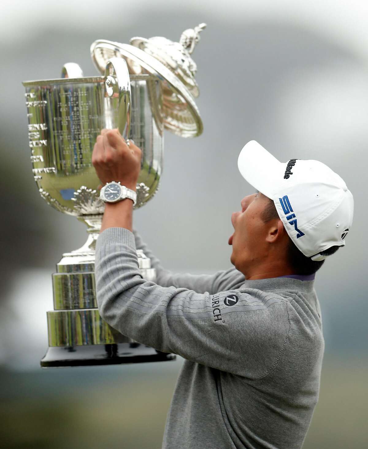 Cal Alum Collin Morikawa gasps at the top of the Wanamaker Trophy falls off during trophy ceremony after Morikawa won PGA Championship at TPC Harding Park in San Francisco, Calif., on Sunday, August 9, 2020. Morikawa shot a final round 64 (-6) and -13 for the tournament..