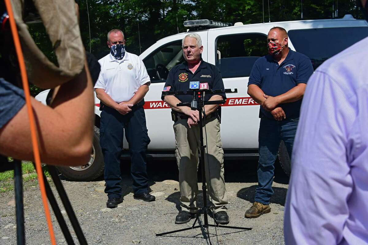 From left, William McGovern, chief of investigations unit at NYS Office of Fire Prevention and Control, Brian LaFlure, Warren County fire coordinator, and Ted Backus, Luzerne-Hadley fire chief, speak to the press about the fire that happened at Rachael Ray's home late Sunday night on Monday, Aug. 10, 2020 in Lake Luzerne, N.Y. (Lori Van Buren/Times Union)