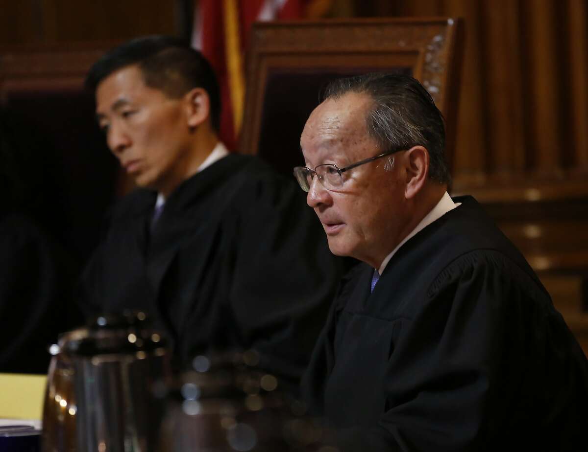 California Supreme Court Associate Justice Ming Chin, right, questions Deputy Attorney General Jay Russell, unseen, about the state's arguments opposing a lawsuit filed by the California Republican Party to overturn a recently approved state law requiring presidential candidates to disclose their tax returns in order to be of the state's primary ballot, in Sacramento, Calif., Wednesday, Nov. 6, 2019. The law, if upheld, is intended to force President Donald Trump to release his tax returns before California's primary election that will be held in March 2020. (AP Photo/Rich Pedroncelli, Pool)