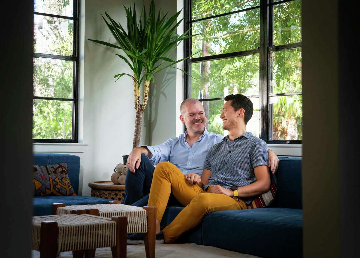 Kendall Satcher (left) and Ben Nguyen originally planned to be married this summer at their home in Houston's Sixth Ward. When the COVID-19 pandemic cancelled their plans, the couple ended up having to travel to Galveston Island to receive a marriage license after learning that Harris County did not have any available appointments because of a backlog. Photographed in their home , Monday, Aug. 10, 2020, in Houston.