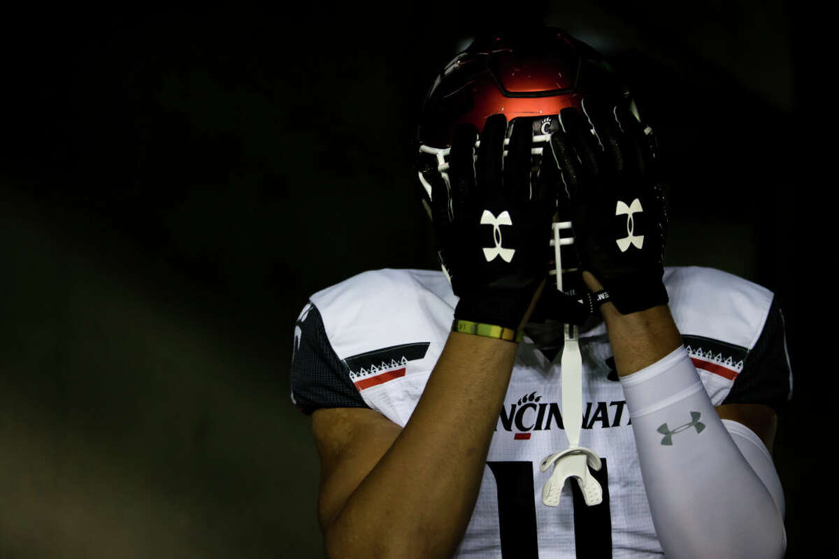 Cincinnati Bearcats tight end Leonard Taylor (11) poses in the tunnel before the South Florida Bulls game versus the Cincinnati Bearcats on November 16, 2019 at Raymond James Stadium in Tampa, FL. (Photo by Mary Holt/Icon Sportswire via Getty Images)