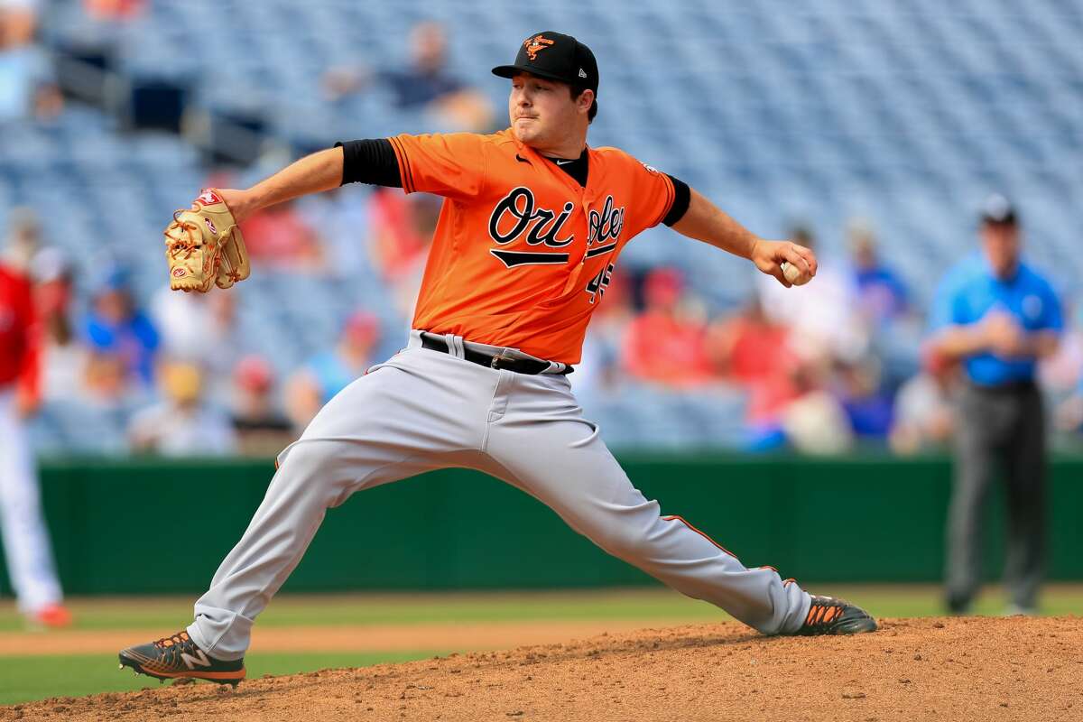 Baltimore Orioles' Keegan Akin delivers a pitch during a Feb. 24, 2020 spring training game against the Philadelphia Phillies in Clearwater, Fla.