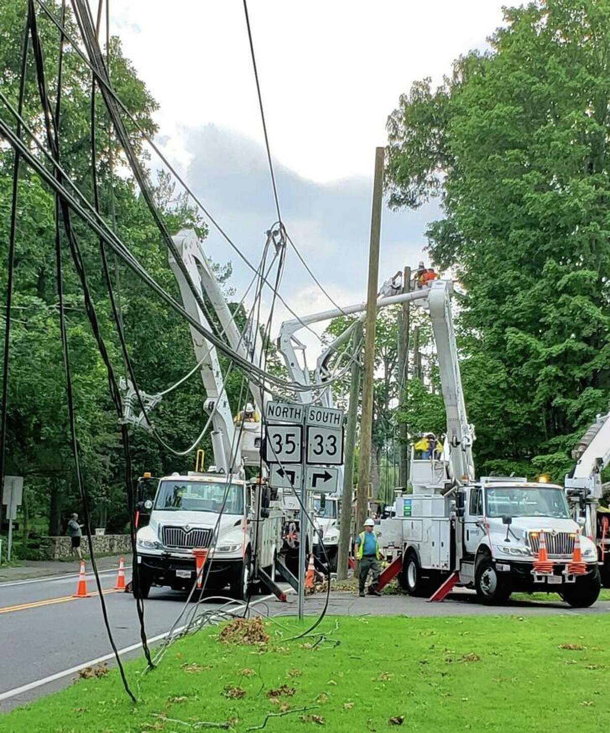Utility trucks and crews began dealing with a rat's next of wires down near the intersection of Route 33 and 35 in Ridgefield. Eversource is 99percent of customer sin town will have power back by midnight tonight, Tuesday.