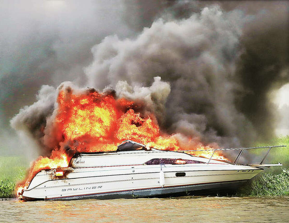 The fire that destroyed a Bayliner boat Monday in the public boat launch area of the Alton Marina is suspected to have started from a malfunctioning bilge pump. A man injured in the incident was rushed to a local hospital but his name has not been released. Dozens of people were drawn to the levee to watch the boat fire which Alton firefighters allowed to burn itself out.