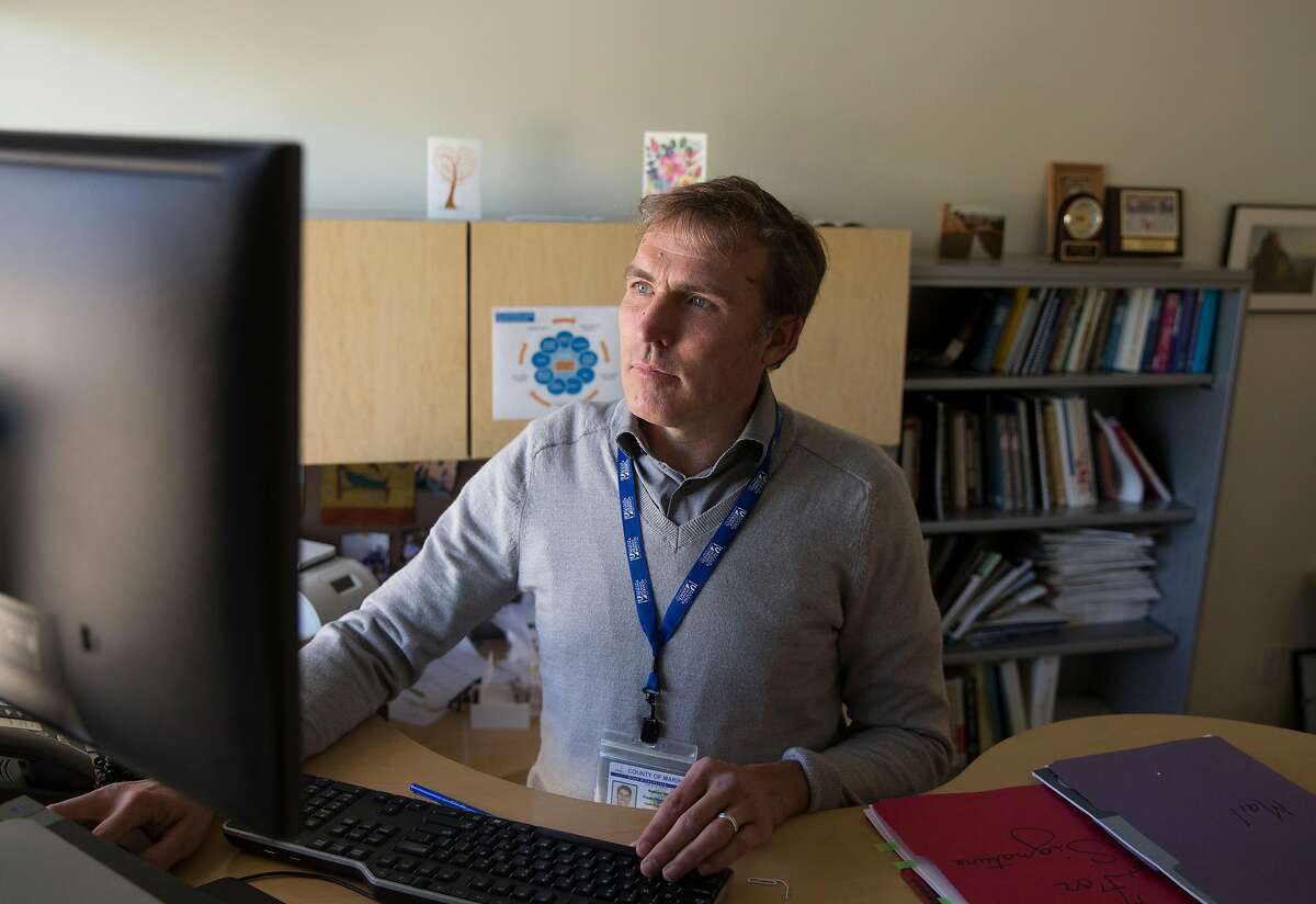 Marin County Public Health Officer Dr. Matthew Willis works inside his office Thursday, April 19, 2018 in San Rafael, Calif.