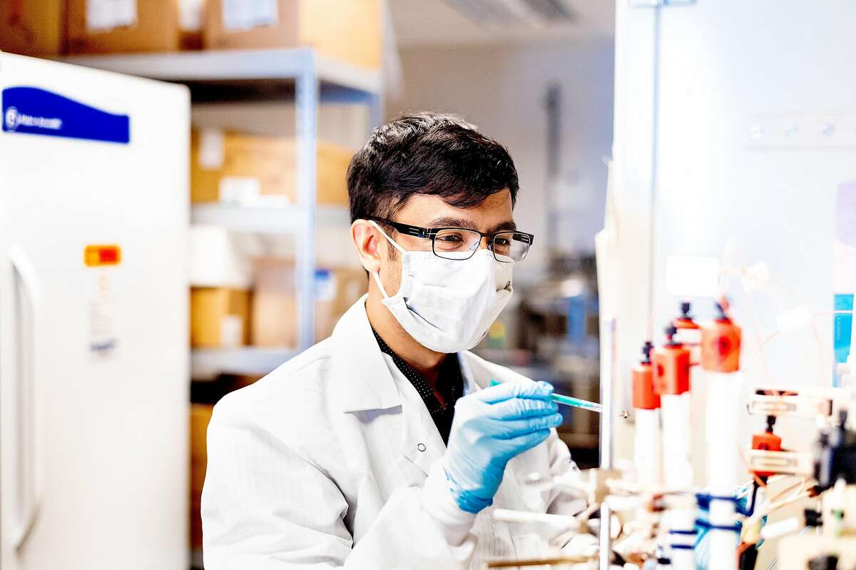UCSF’s Dr. Aashish Manglik, MD, PhD, works in his lab on Thursday, July 30, 2020, at UCSF’s Mission Bay campus. Working with Peter Walter, PhD, he has created the foundation for an inhalable “biological PPE” that could guard against SARS-COV-2.