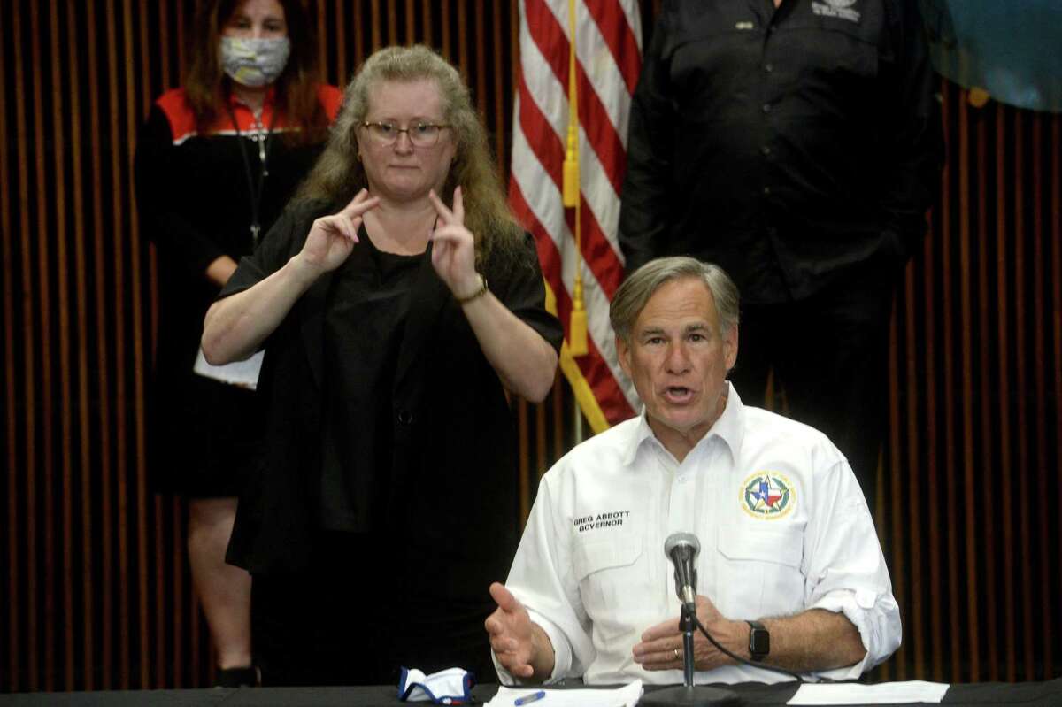 Governor Greg Abbott speaks during a press conference with local officials at the Jefferson County Courthouse Tuesday to discuss the status of COVID-19 cases in the area, testing, and other issues. Photo taken Tuesday, August 11, 2020 Kim Brent/The Enterprise