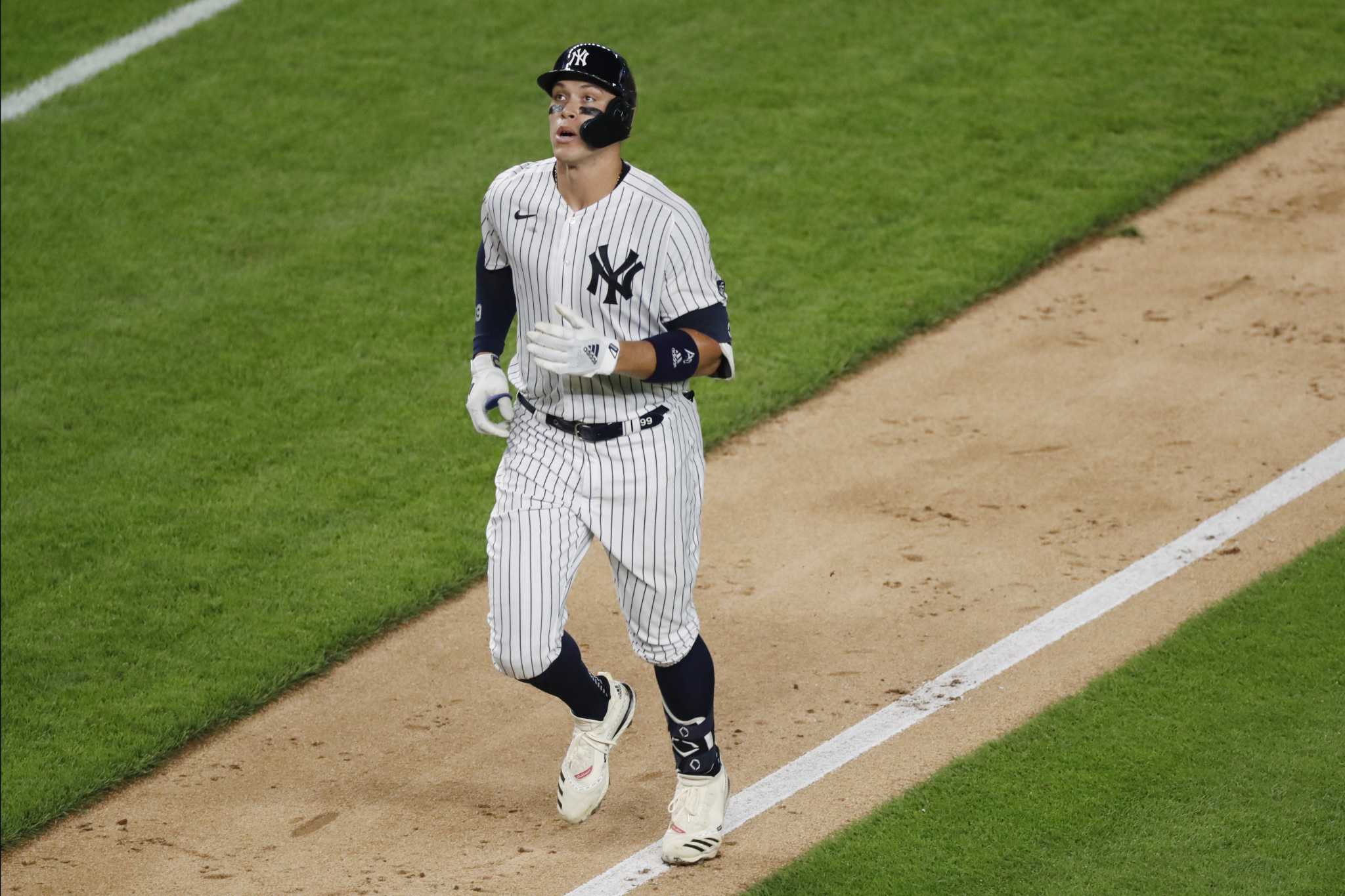 Judge homers, leaves early in Yankees' 9-6 win over Braves