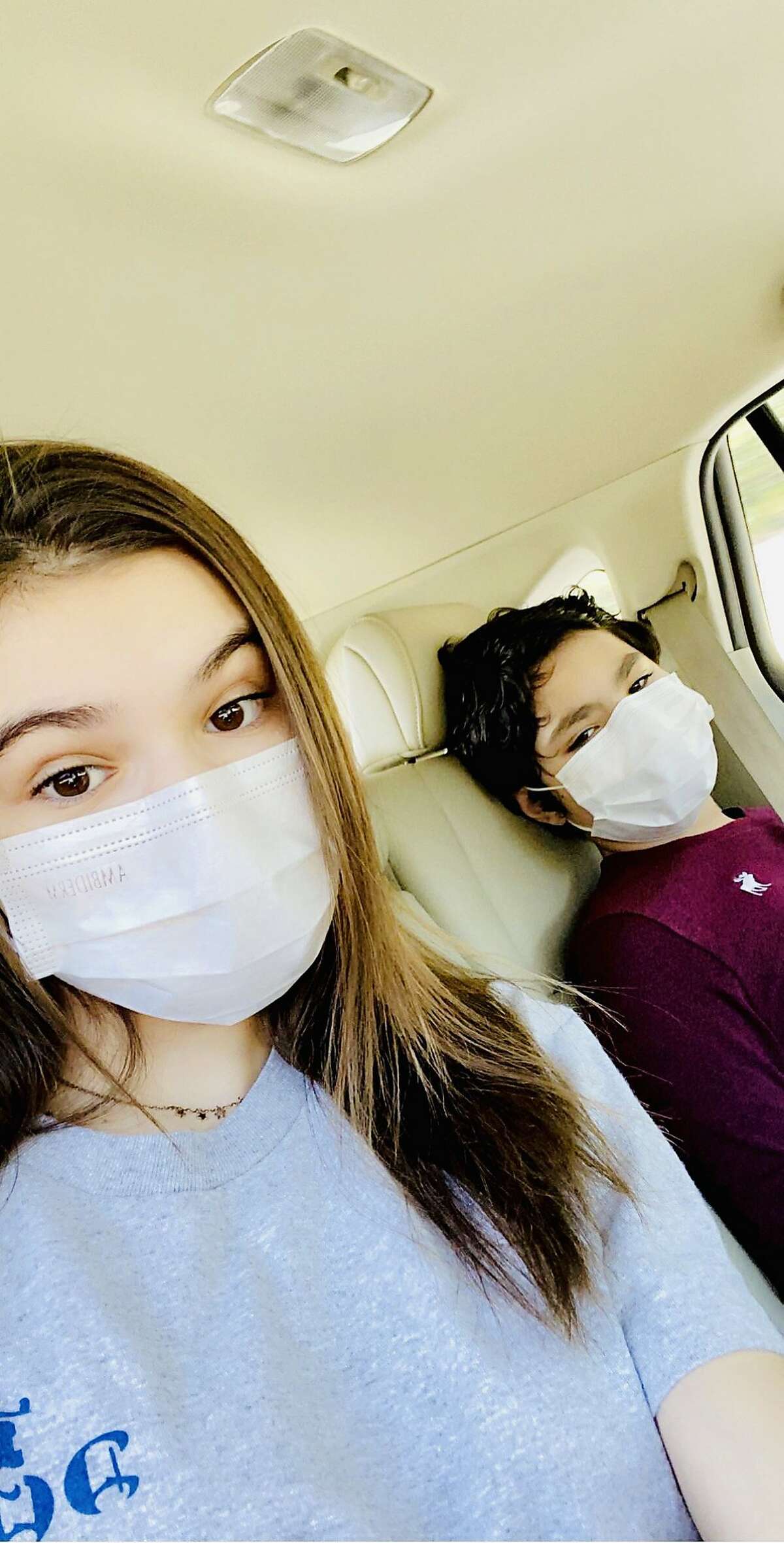 Natalia and Santiago Ruspini on the way to get tested for COVID-19 on April 30, a month after positive results for themselves, their parents, and their family. Their nanny and father were hospitalized but recovered. Natalia tested negative a day later, on May 1, Santiago on May 8.