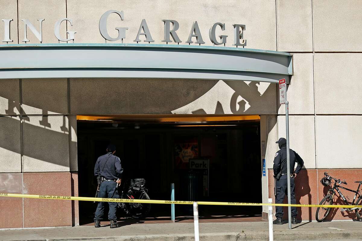 San Francisco Police search for shooting suspect in parking garage at 5th and Mission Street in San Francisco, Calif., on Wednesday, August 12, 2020. As homicides rise throughout the Bay Area during the coronavirus outbreak, San Francisco police have reported 45 killings so far this year, compared to 41 for all of 2019.