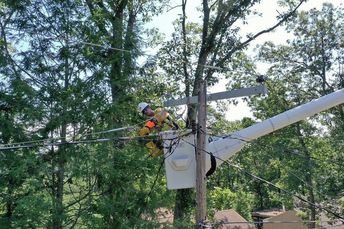 Ten days after after Tropical Storm Isaias tore through Connecticut, hundreds of Eversource customers remain without power on Thursday, Aug. 13, 2020. Eversource said the remaining outages are “more complex and take additional time to complete.”