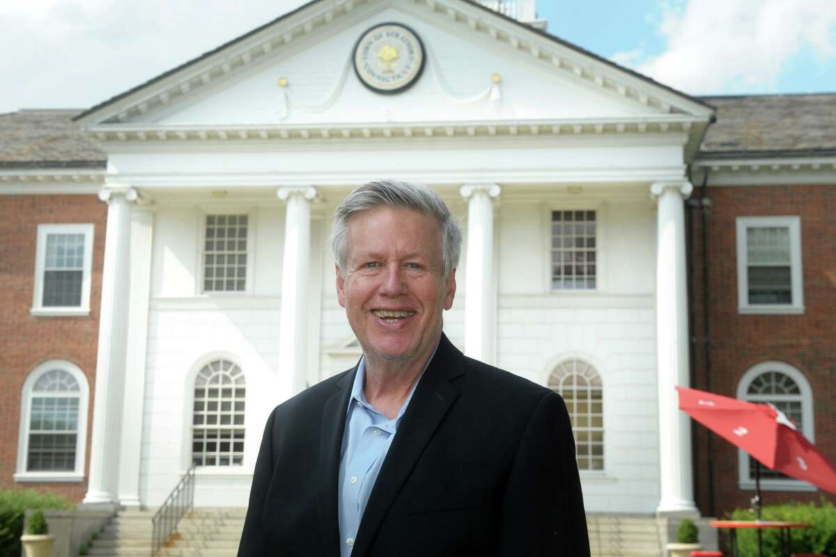 Jim Simon poses in front of Stratford Town Hall, in Stratford, Conn. Aug. 12, 2020.