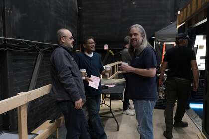 Showrunner Naren Shankar, center, is shown on the set of the Amazon Prime Video series "The Expanse" with supervising producer Lewin Webb, left, and Ty Franck, one of the two authors of the books that spawned the hit sci-fi show.