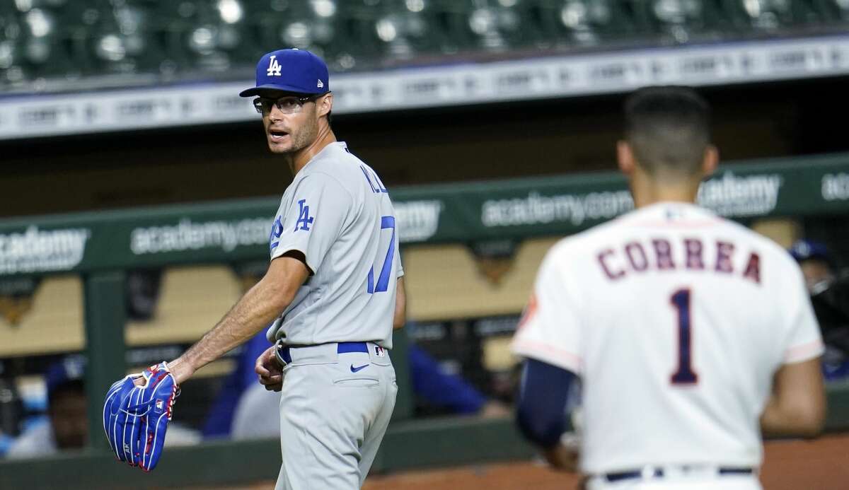 This moment - Joe Kelly going to the dugout as Carlos Correa stares him down - made the Dodgers reliever some sort of hero.