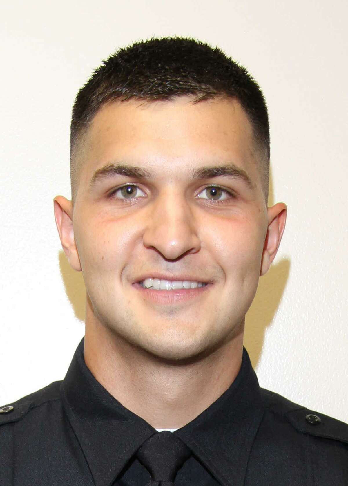 Officer Thomas H. Villarreal was fired in July after police say he used excessive force in punching a suspect who had fled on foot after a traffic stop.