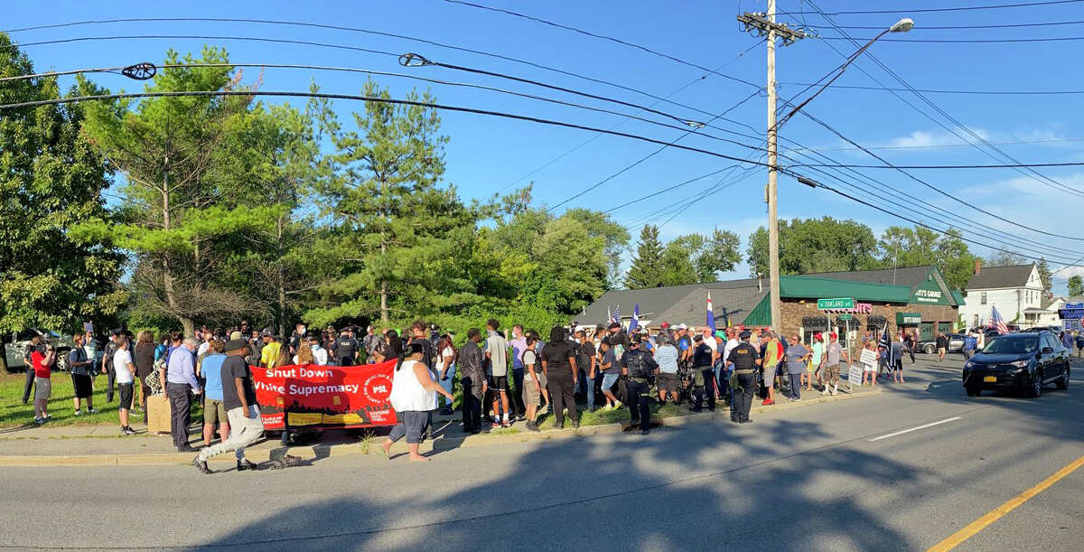 Protesters amass in front of Coccadott's on Central Avenue in Albany on Thursday, Aug. 13, 2020. (Lori Van Buren / Times Union)