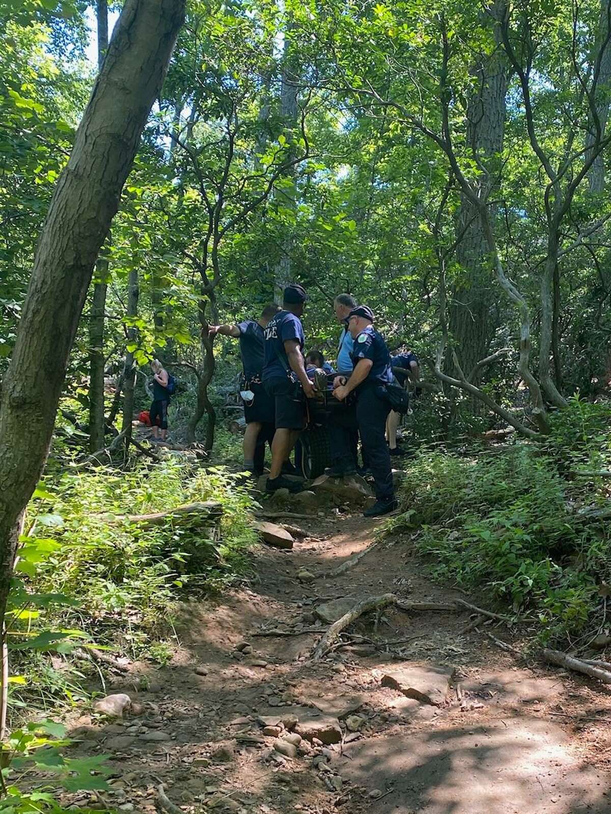 Hamden Fire personnel rescue a person at Sleeping Giant State Park in Hamden July 18, 2020