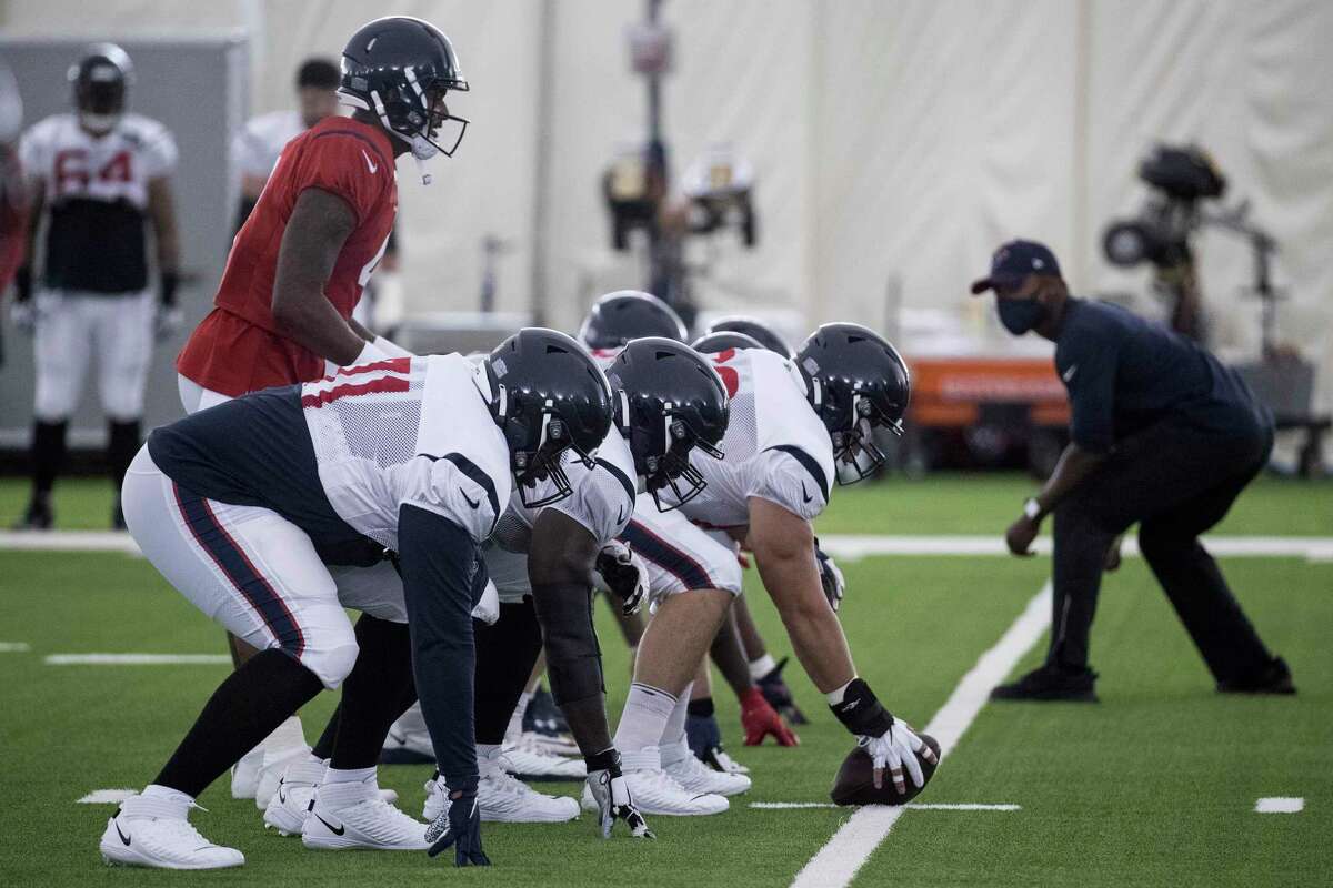 Houston Texans quarterback Deshaun Watson (4) lines up under center during an NFL training camp football practice Friday, Aug. 14, 2020, at The Houston Methodist Training Center in Houston.