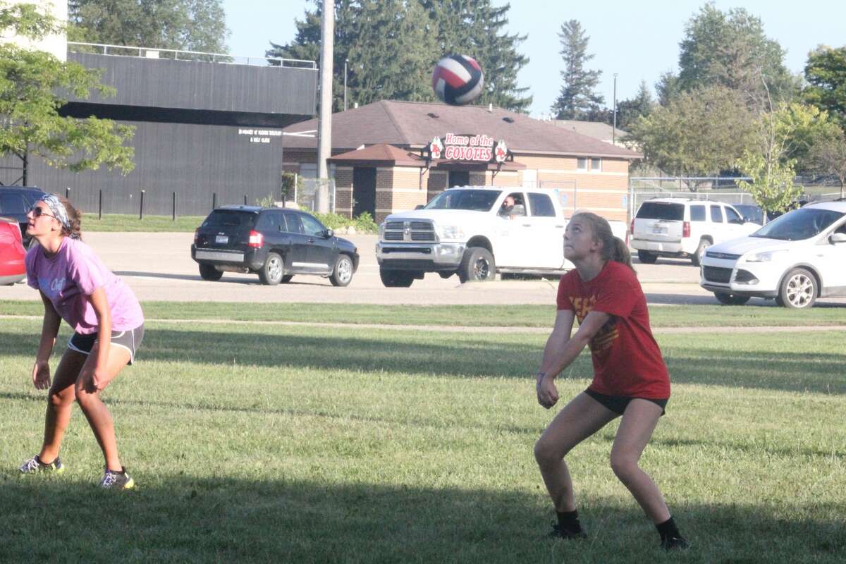 Reed City's volleyball team started its practices outdoors on Wednesday.