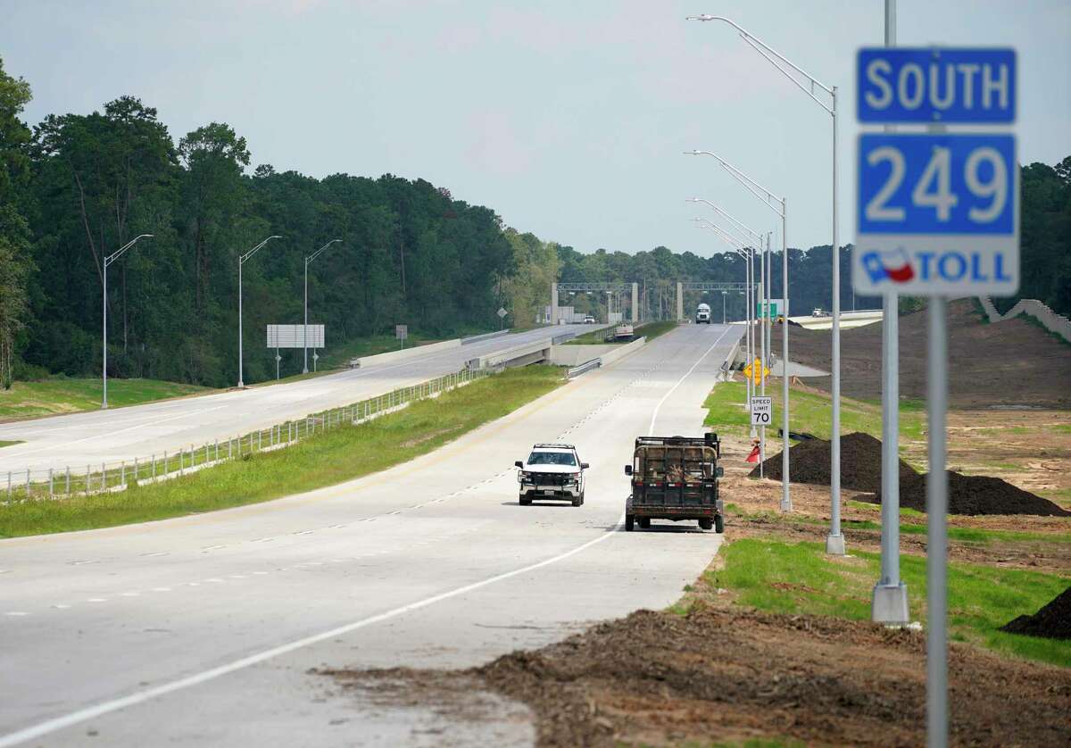 A view of work vehicles on the south bound of 249 Tollway in Montgomery County are shown Thursday, Aug. 6, 2020. The section north of Tomball to FM 1488 will open on Saturday.