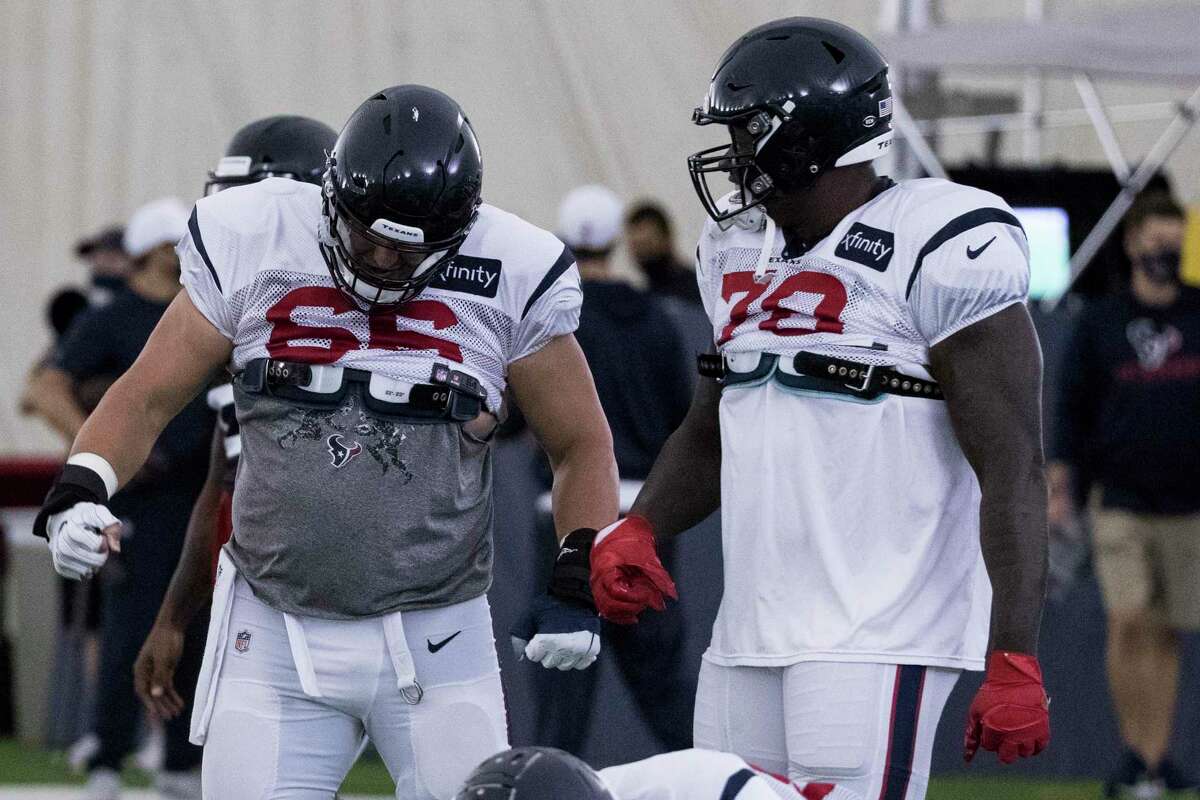 Houston Texans center Nick Martin (66) and offensive tackle Laremy Tunsil (78) warm up during an NFL training camp football practice Saturday, Aug. 15, 2020, at The Houston Methodist Training Center in Houston.