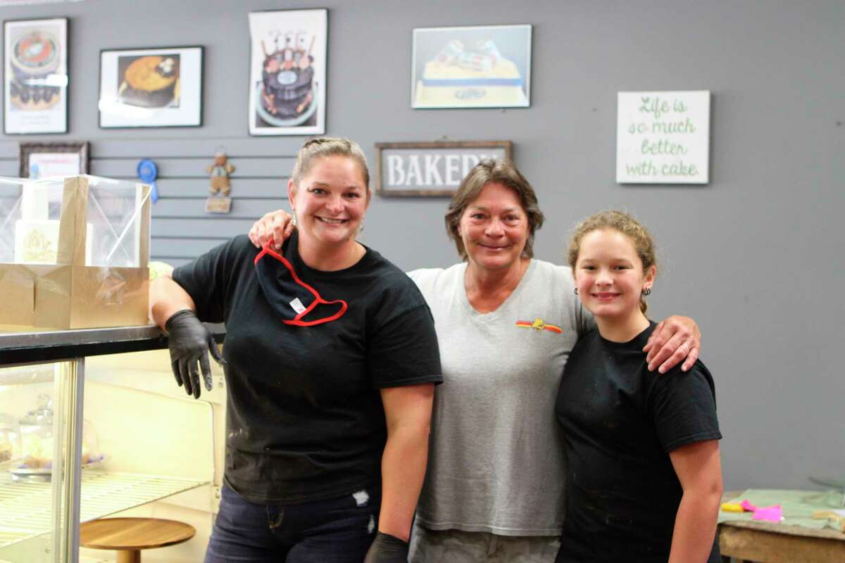 (From left) Niki Stricker, Doni Cassiey and Maddy Stricker work hard every day to bring a wide variety of sweet treats to the people of Big Rapids at The Pie wHole. Niki Stricker said the business would not be possible without the help of her family. (Pioneer photo/Taylor Fussman)