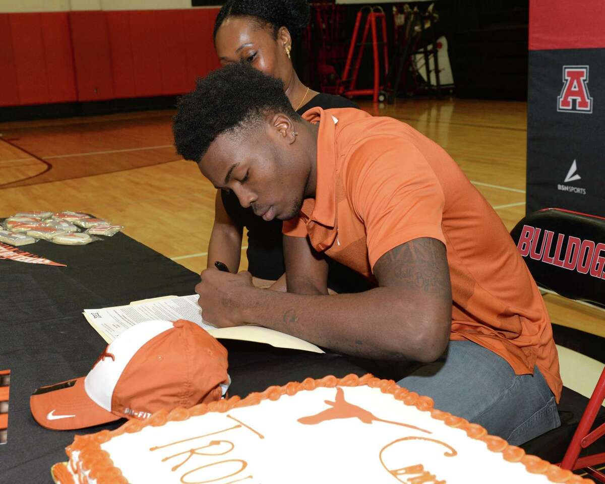 Troy Omeire of Ft. Bend Austin High School signs a commitment to play for the University of Texas on National Signing Day, December 18, 2019 in Sugar Land, TX.
