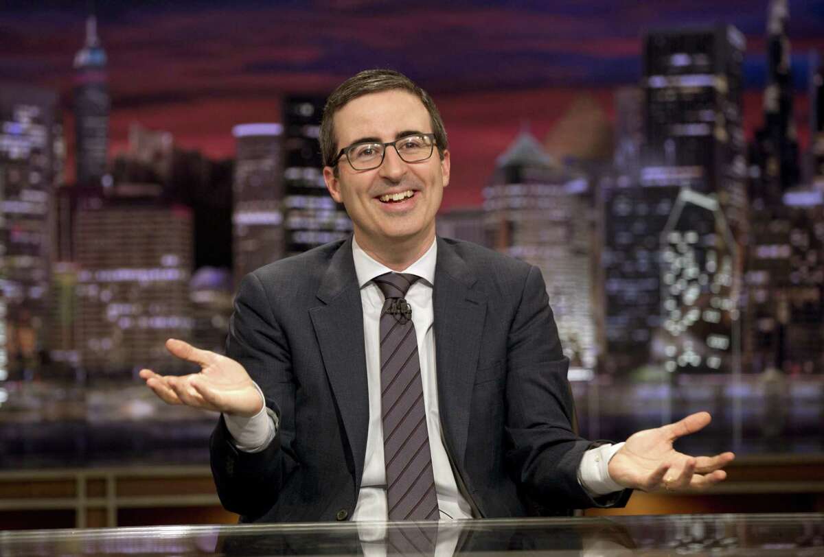 This Oct. 18, 2015 image released by HBO shows John liver from ""Last Week Tonight with John Oliver." “If you are going to forget a town in Connecticut, why not forget Danbury because — and this is true — (expletive) Danbury. From its charming railway museum, to its historic hearthstone castle, Danbury Connecticut can eat my whole a**,” Oliver said. Warning: This video includes vulgar language. The joke was in reference to a segment in which Oliver talked about a glitch in Connecticut's jury selection computer program that caused residents from Hartford and New Britain to be excluded from any jury duty summons for three years. And it didn’t end there.