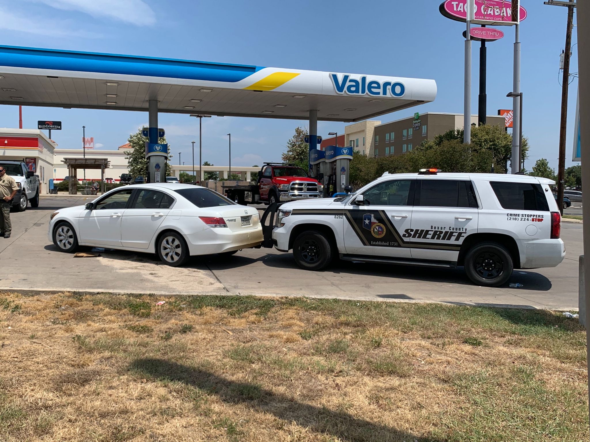 Armed robbery suspects allegedly had gun, 'Cop Killers' book in car