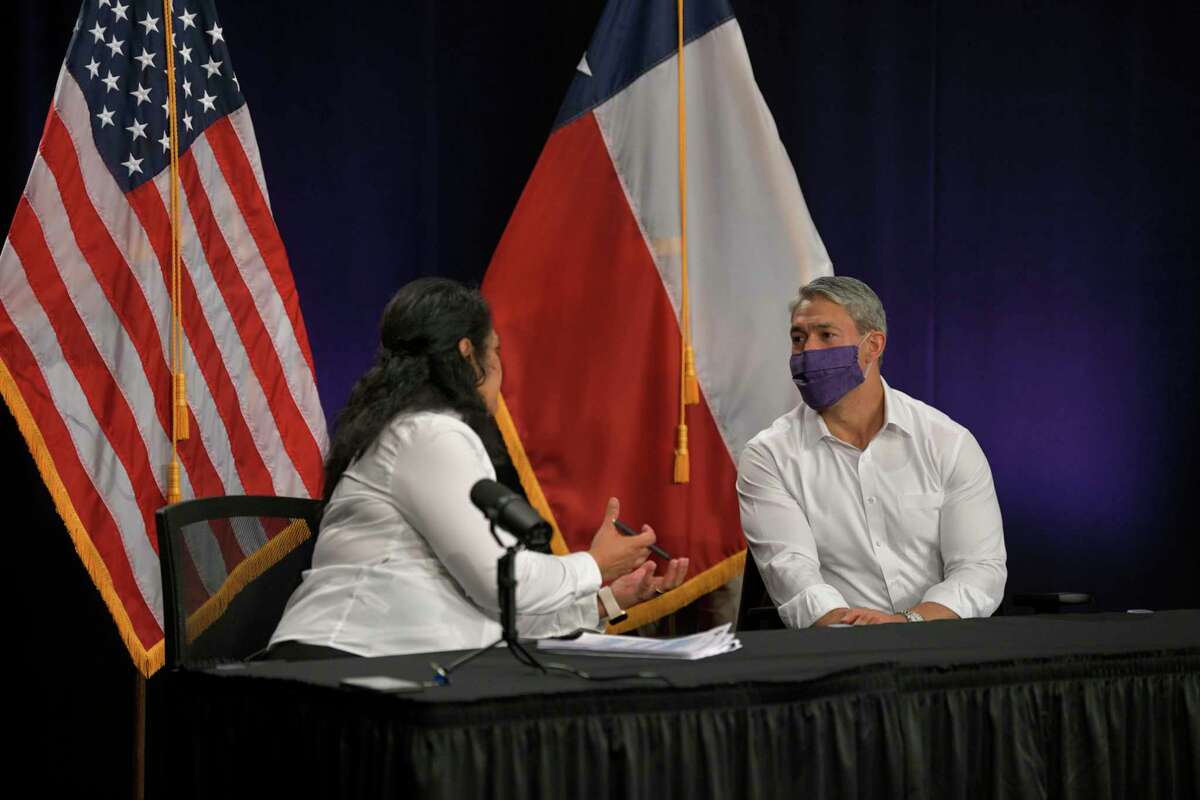 Mayor Ron Nirenberg speaks with Anita Kurian, chief epidemiologist for the San Antonio Metropolitan Health District, after the daily city-county coronavirus briefing on Monday, Aug. 17, 2020. Nirenberg said 70 more people had tested positive for COVID-19 in San Antonio.